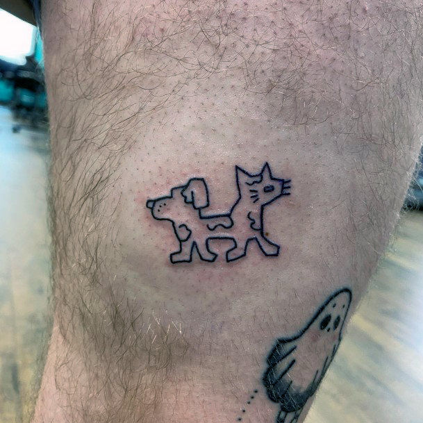 Neat Catdog Tattoo On Female