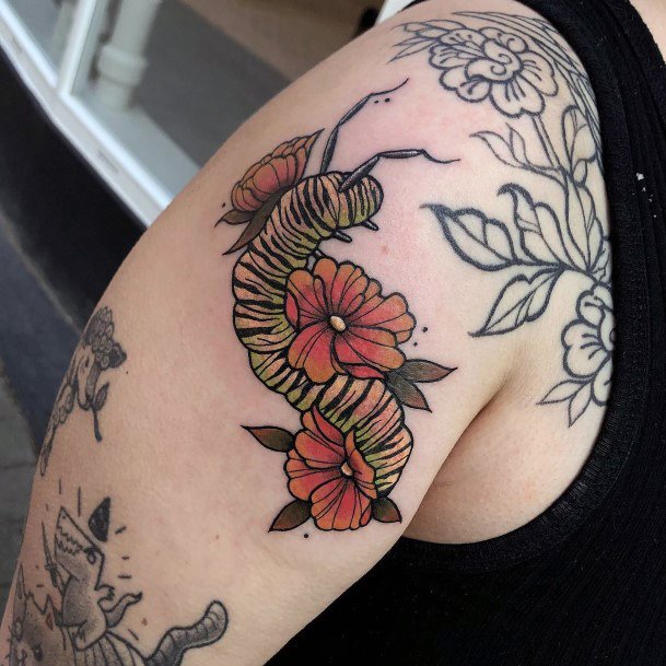 Neat Caterpillar Tattoo On Female