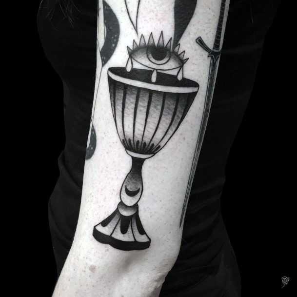 Neat Chalice Tattoo On Female