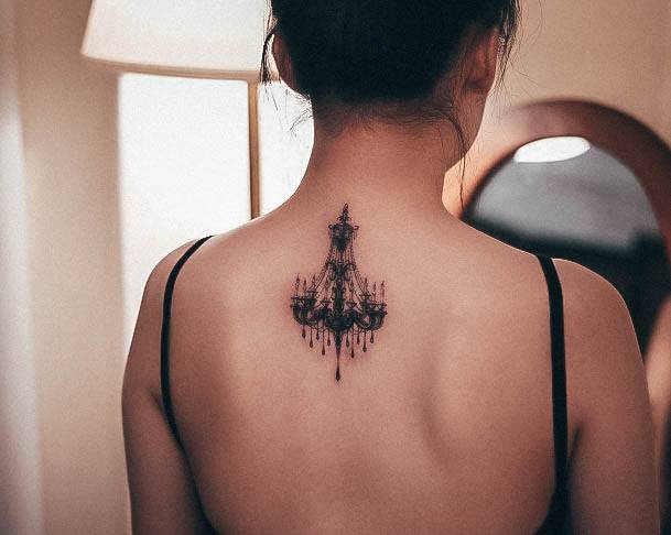 Neat Chandelier Tattoo On Female