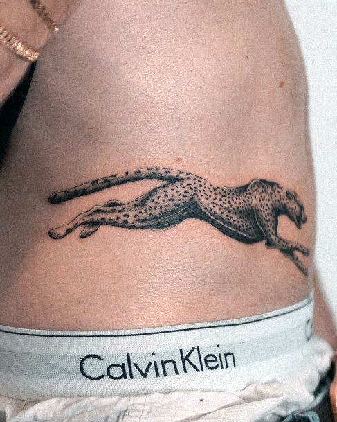 Neat Cheetah Tattoo On Female