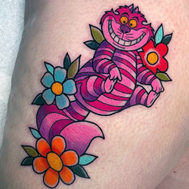 Neat Cheshire Cat Tattoo On Female