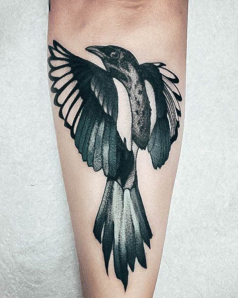 Neat Crow Tattoo On Female