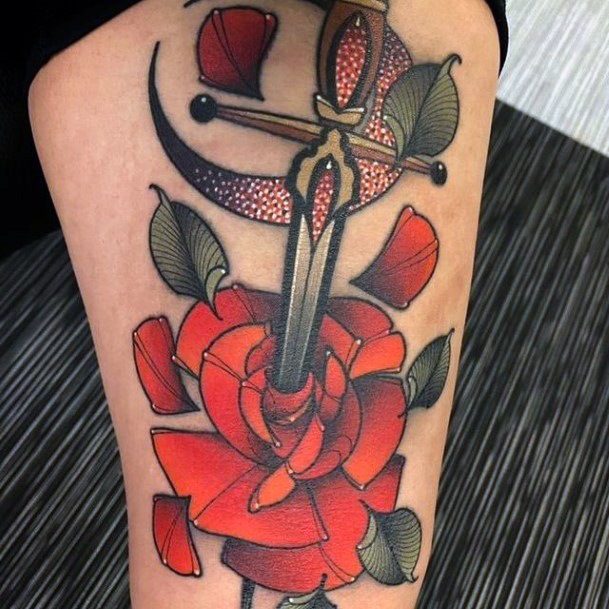 Neat Dagger Rose Tattoo On Female