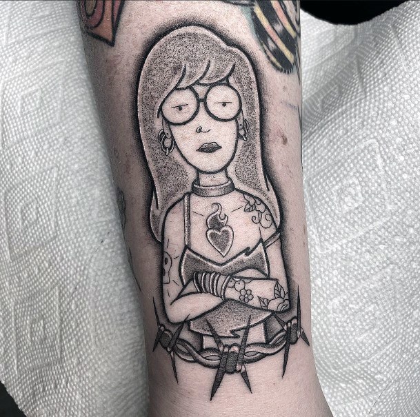 Neat Daria Tattoo On Female