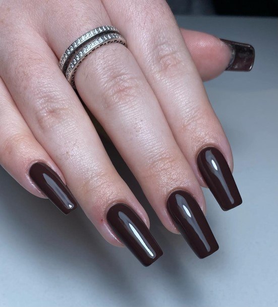 Neat Dark Brown Nail On Female