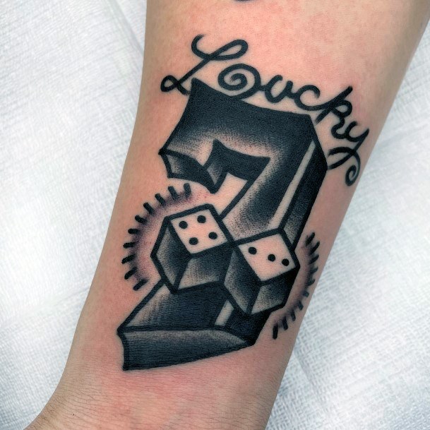 Neat Dice Tattoo On Female