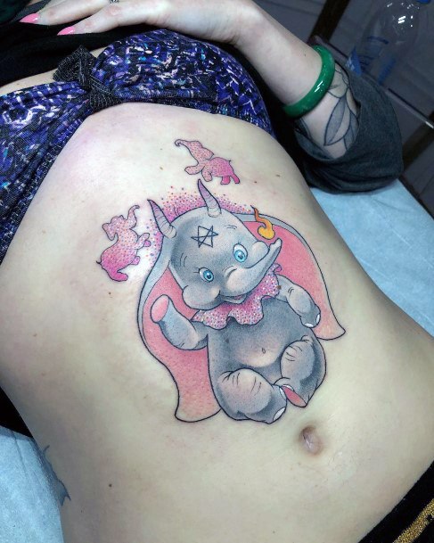 Neat Dumbo Tattoo On Female