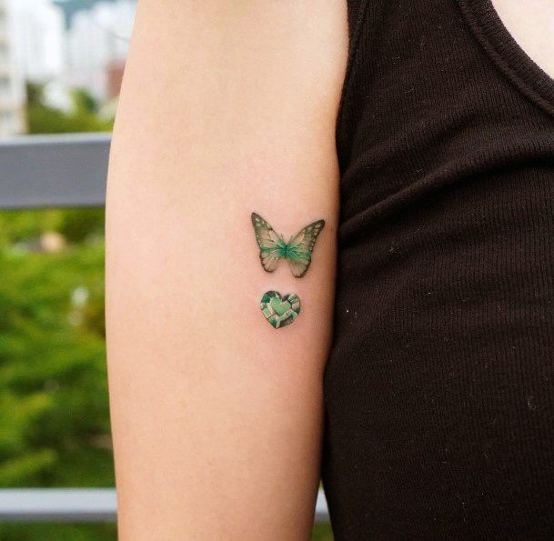 Neat Emerald Tattoo On Female