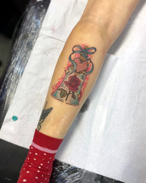 Neat Enchanted Rose Tattoo On Female