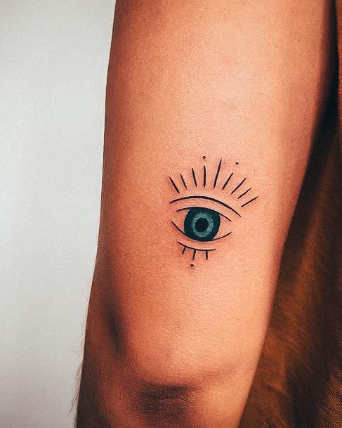 Neat Evil Eye Tattoo On Female