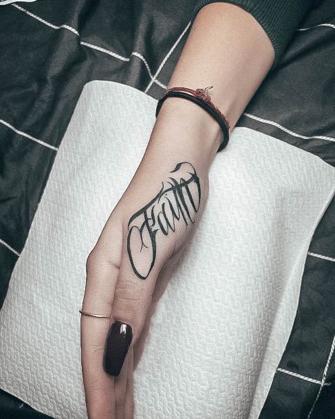 Neat Faith Tattoo On Female