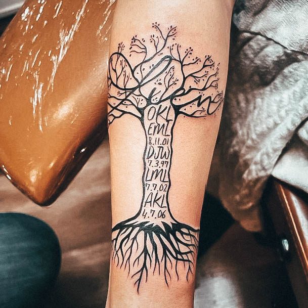 Neat Family Tree Tattoo On Female