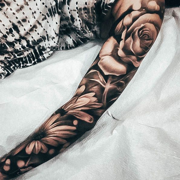 Neat Floral Tattoo On Female