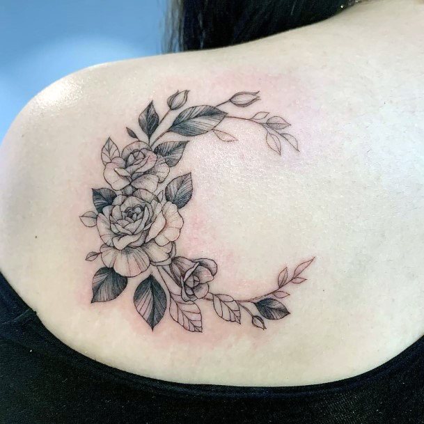 Neat Flower Moon Tattoo On Female