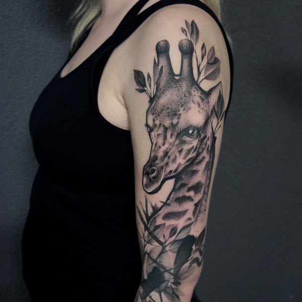 Neat Giraffe Tattoo On Female