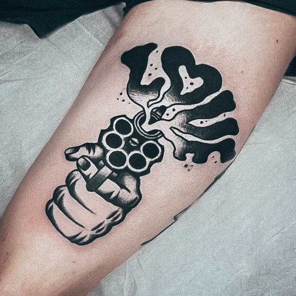 Neat Gun Tattoo On Female