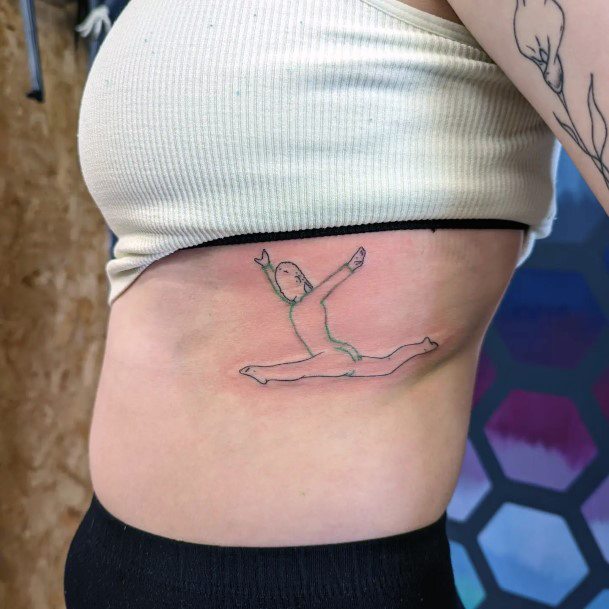 Neat Gymnastics Tattoo On Female