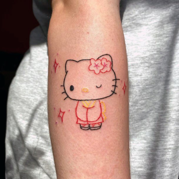 Neat Hello Kitty Tattoo On Female