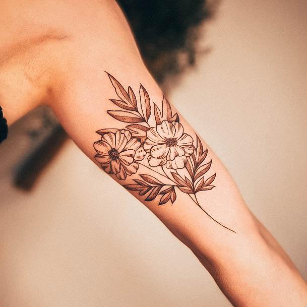 Neat Inner Arm Tattoo On Female