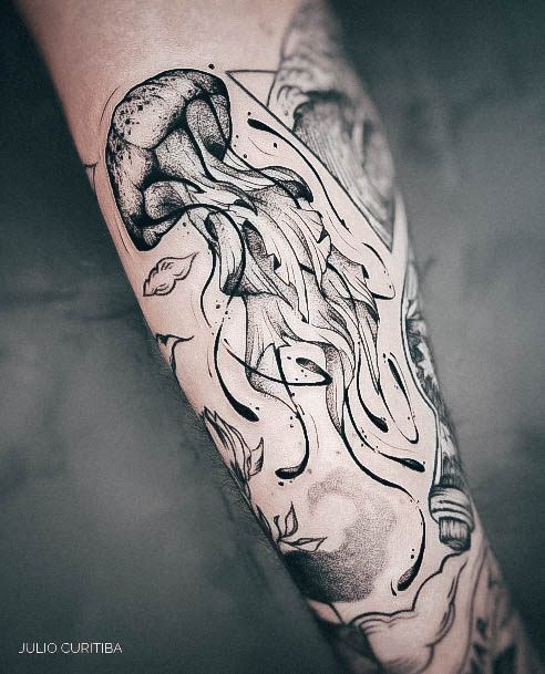 Neat Jellyfish Tattoo On Female