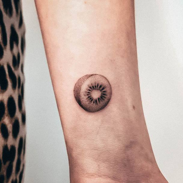 Neat Kiwi Tattoo On Female