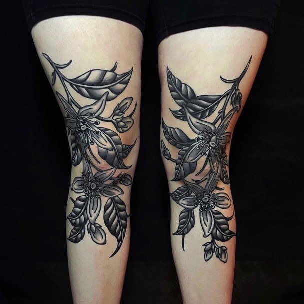 Neat Knee Tattoo On Female