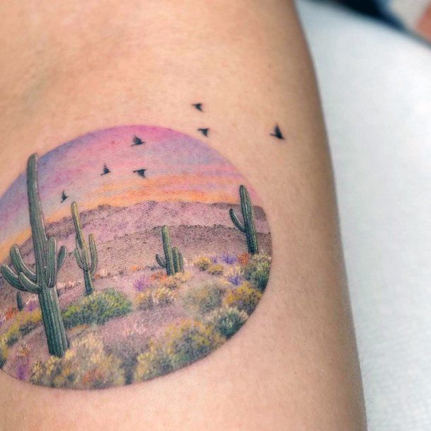 Neat Landscape Tattoo On Female