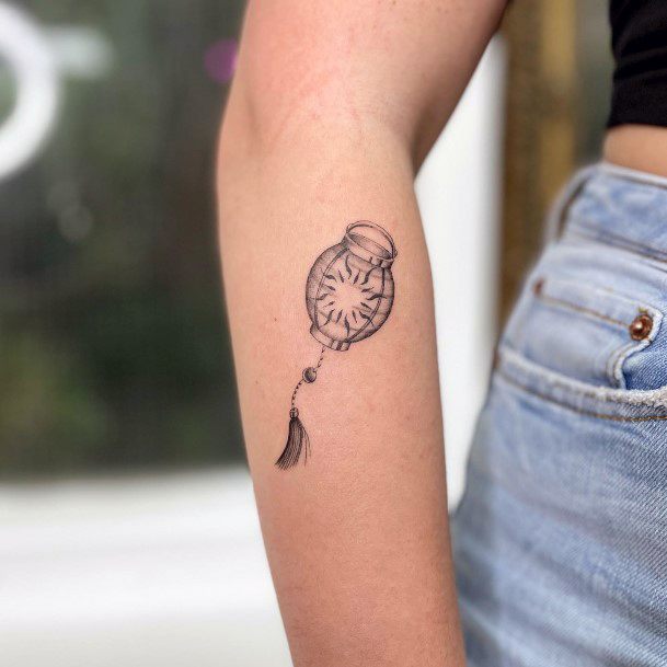 Neat Lantern Tattoo On Female