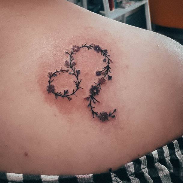 Neat Leo Tattoo On Female