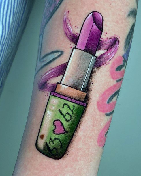 Neat Lipstick Tattoo On Female