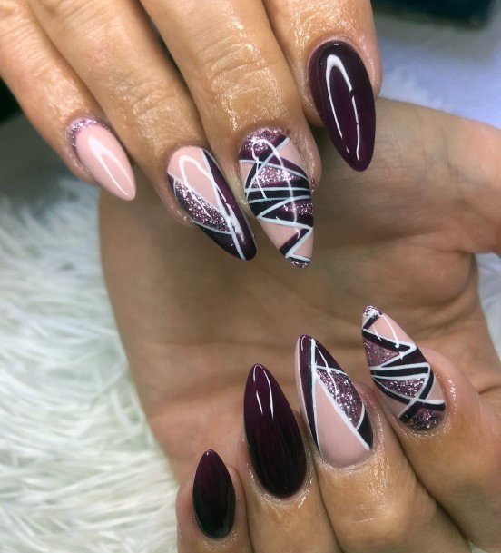 Neat Maroon And Black Nail On Female