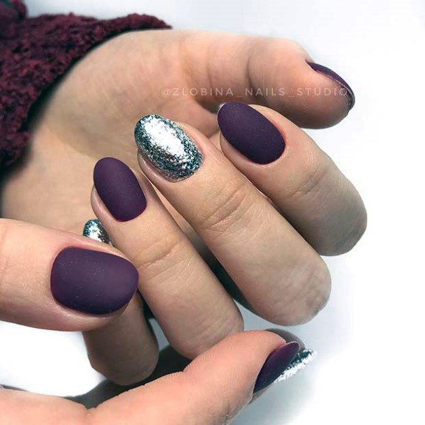 Neat Maroon And Silver Nail On Female