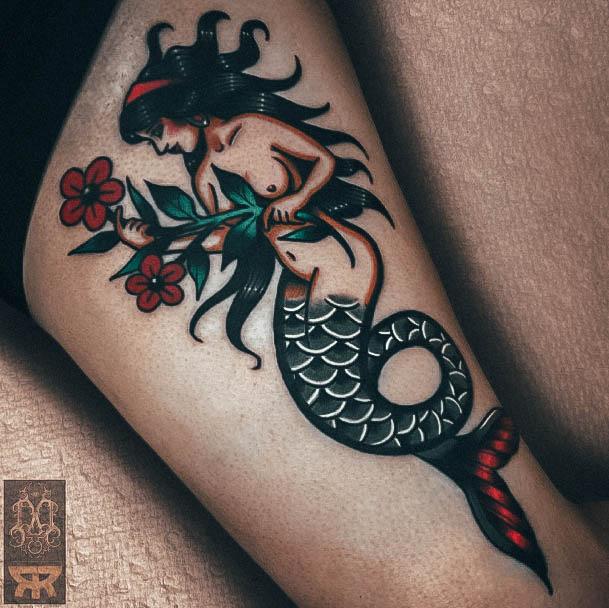 Neat Mermaid Tattoo On Female