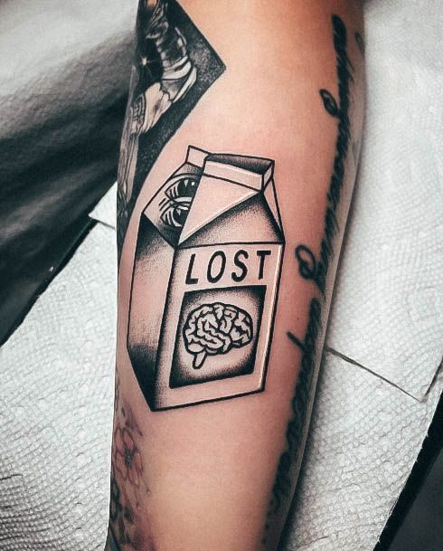 Neat Milk Tattoo On Female