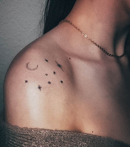 Neat Moon And Stars Tattoo On Female