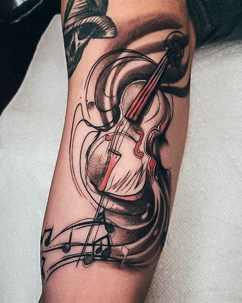 Neat Music Tattoo On Female