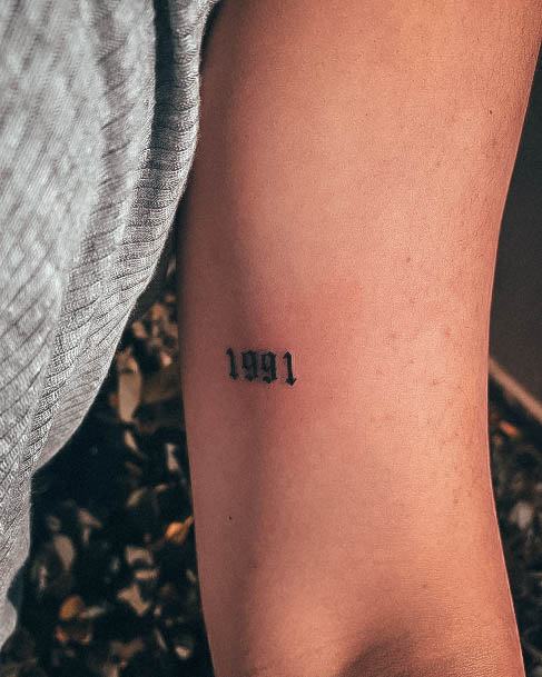 Neat Number Tattoo On Female