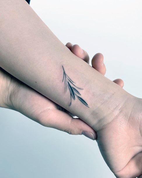 Neat Olive Branch Tattoo On Female