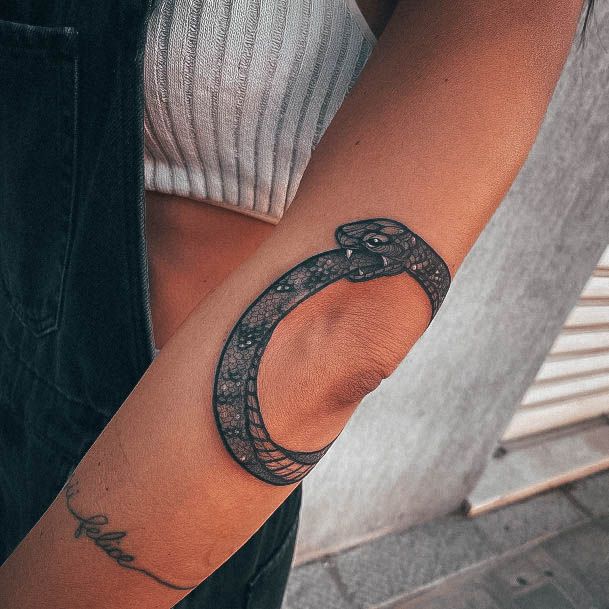 Neat Ouroboros Tattoo On Female