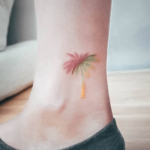 Neat Palm Tree Tattoo On Female