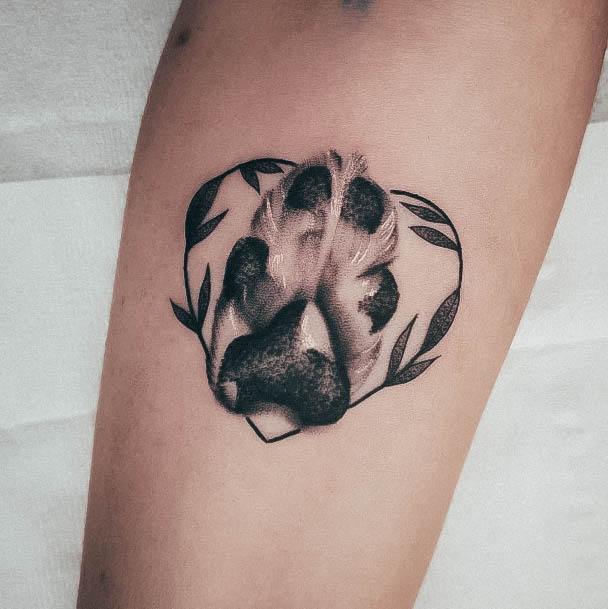 Neat Paw Print Tattoo On Female Pug Dog