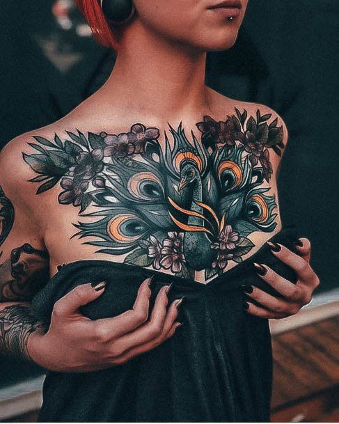 Neat Peacock Tattoo On Female