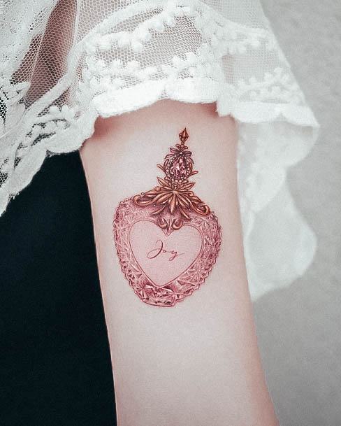 Neat Perfume Tattoo On Female