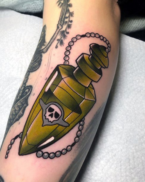 Neat Poison Bottle Tattoo On Female