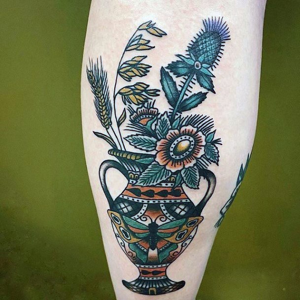 Neat Pottery Tattoo On Female