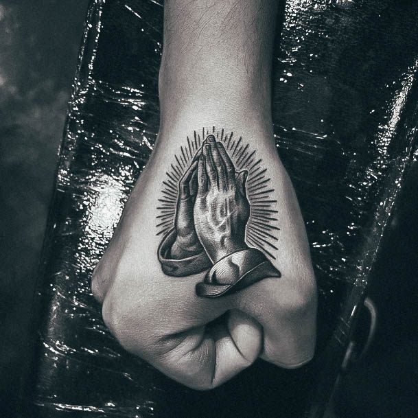 Neat Praying Hands Tattoo On Female