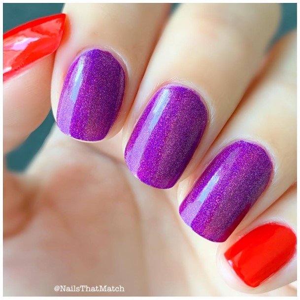 Neat Red And Purple Nail On Female