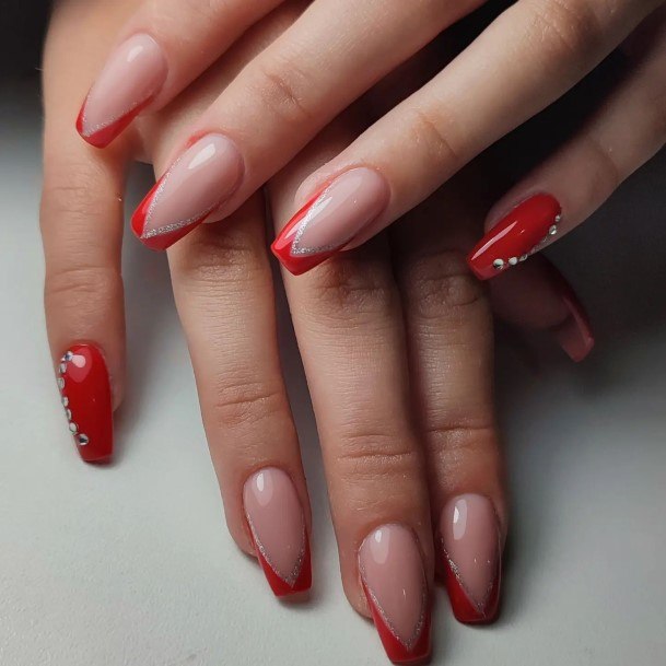 Neat Red And Silver Nail On Female