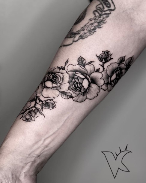 Neat Rose Forearm Tattoo On Female